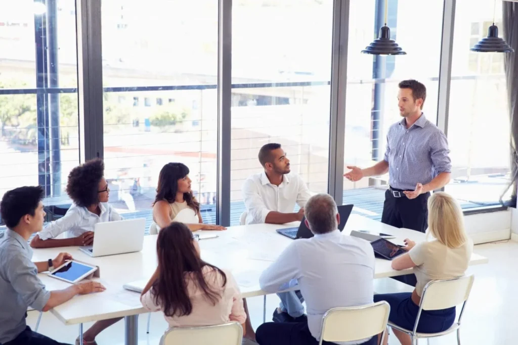 Business team meeting with presenter in conference room