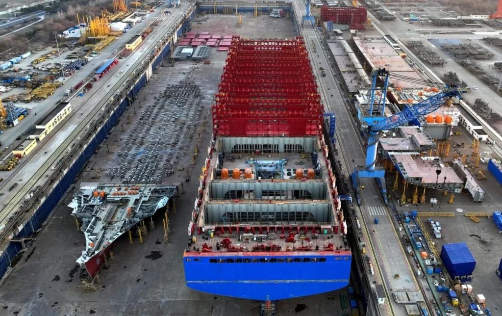 Aerial view of shipyard with ships under construction