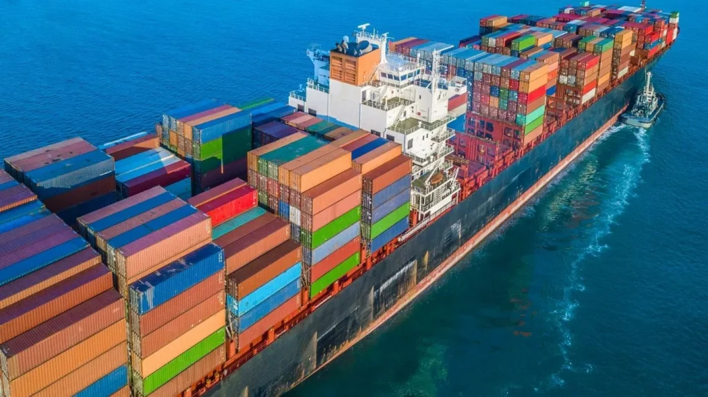 Cargo ship carrying multicolored shipping containers