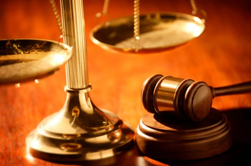 Gavel and brass scales of justice