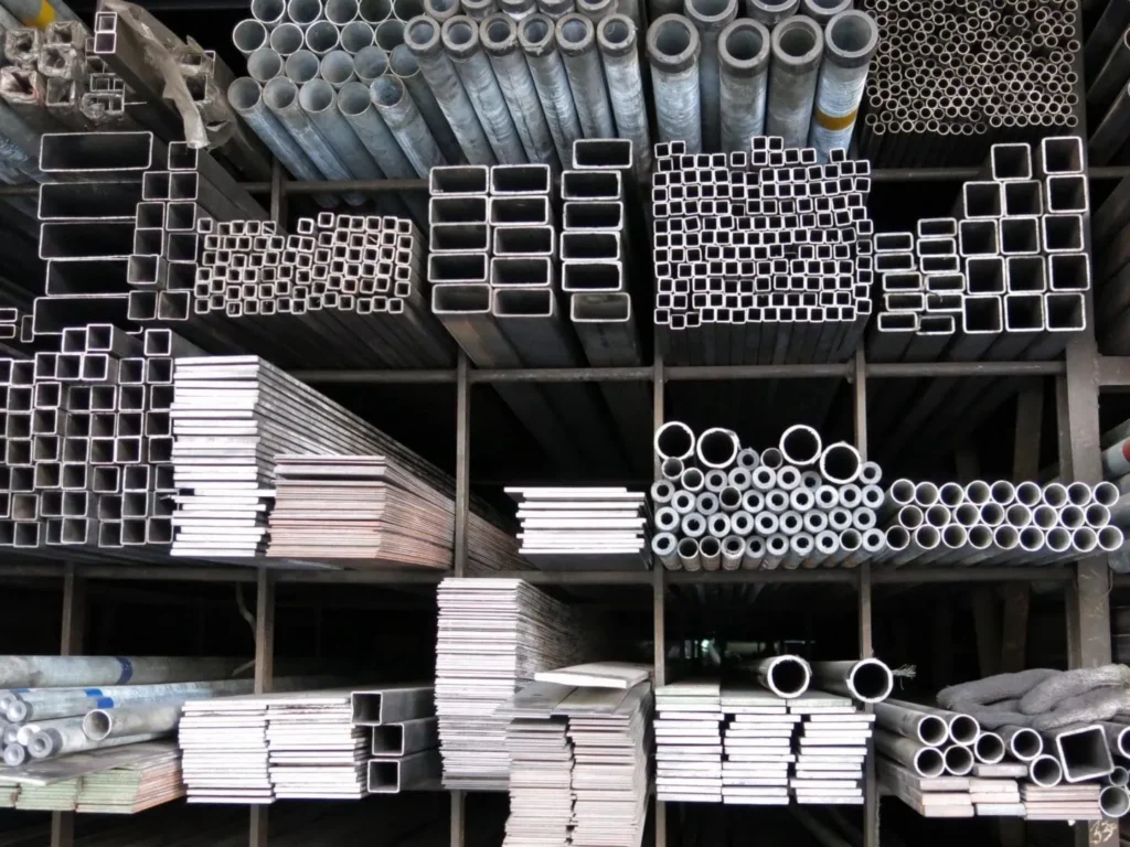 Stacked metal pipes and square tubing